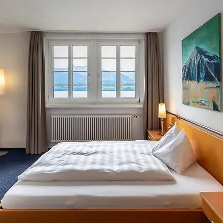 Parkhotel Gunten Lake & Spa Отель Гунтен